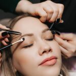 girl-makes-eyebrow-styling-in-a-beauty-salon-the-2023-11-27-05-21-51-utc-min